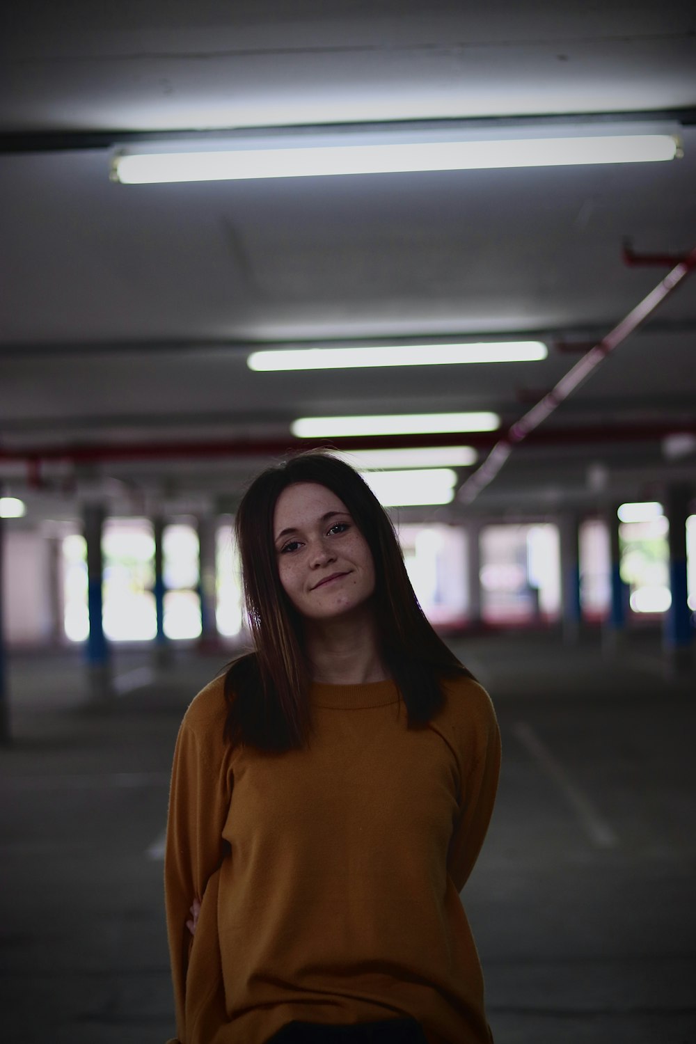 selective focus photo of woman on parking area