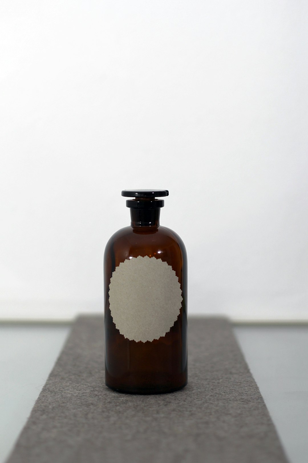 Soy sauce bottle and soybeans