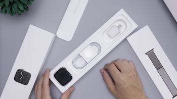 space gray aluminum case Apple Watch and charger in box