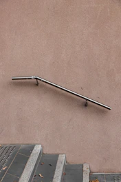 gray stainless steel railings and gray stairs
