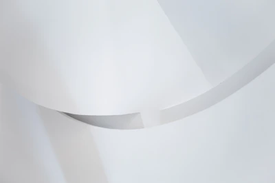 A clean, modern print featuring gentle lines and airy composition in muted tones.