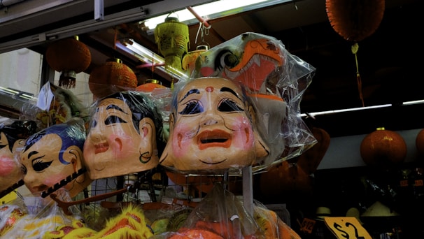 A display of handcrafted Brazilian masks used in cultural festivals.