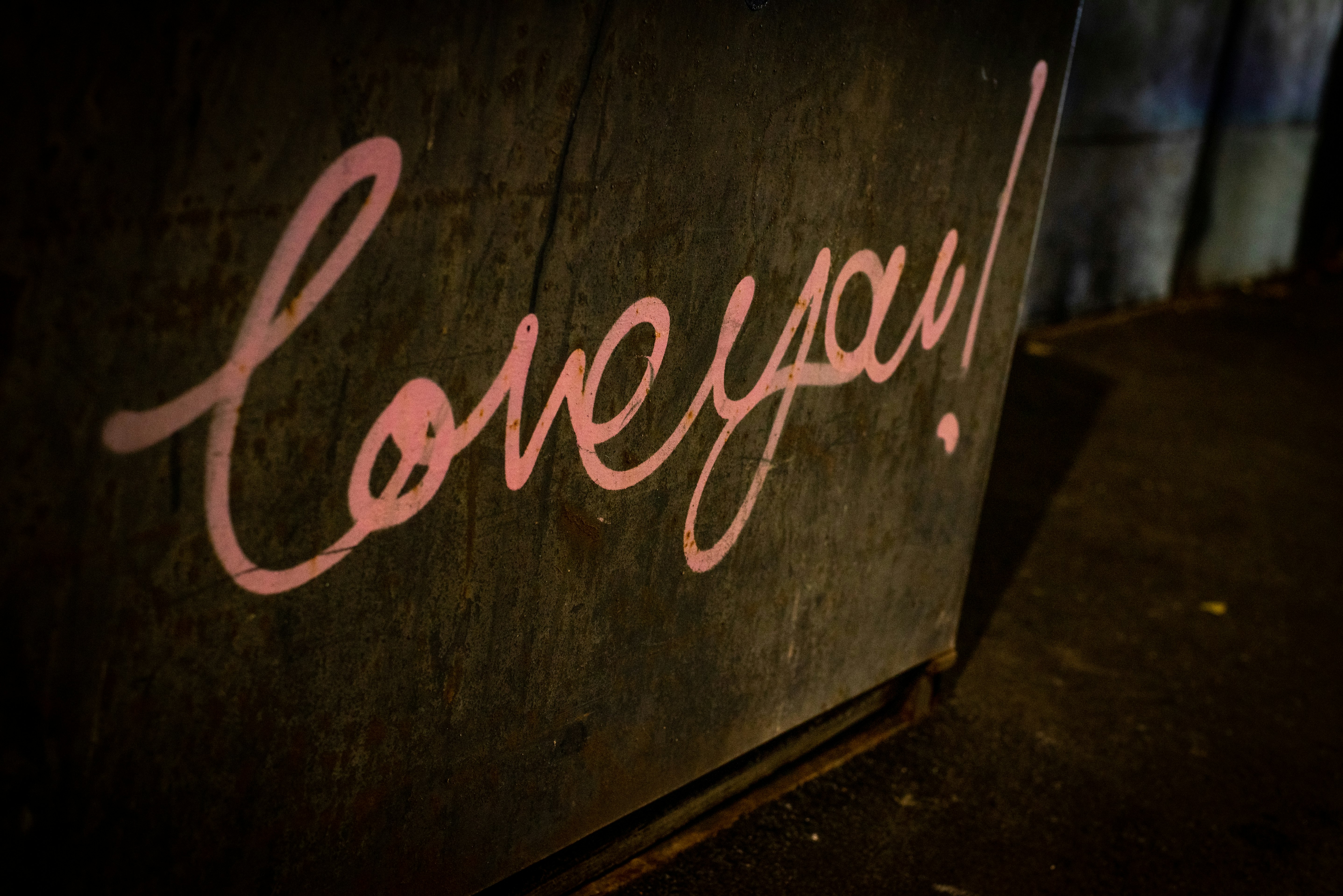 loveyou! text on brown wall