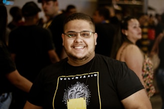 A candid shot of a viral internet star engaging with fans at a public event.