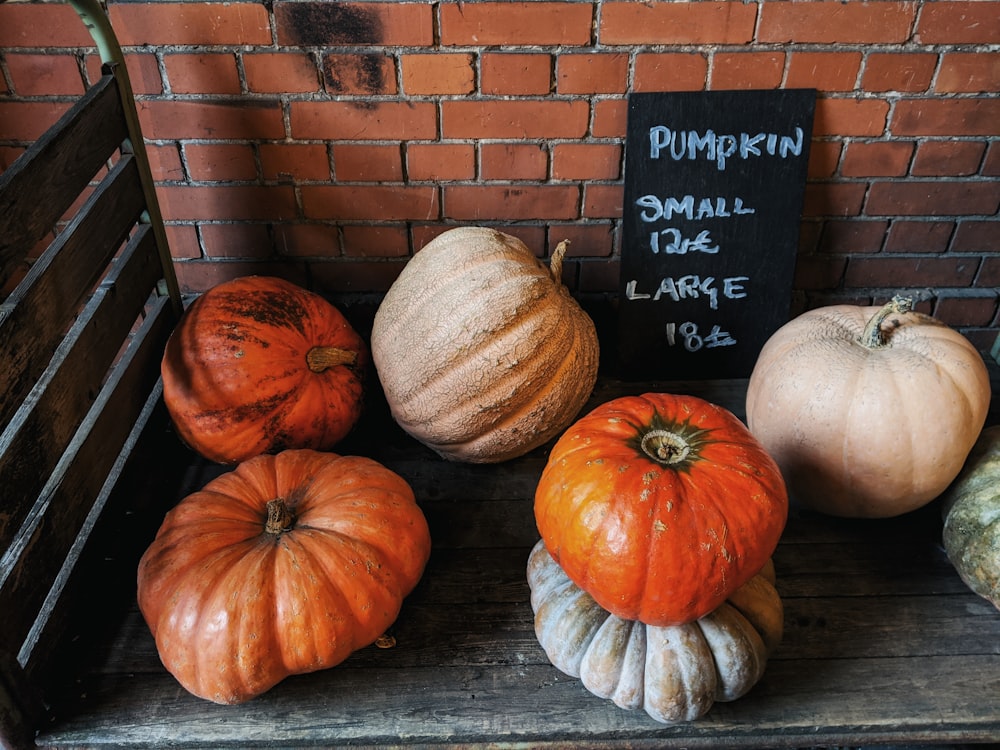 six orange pumpkins