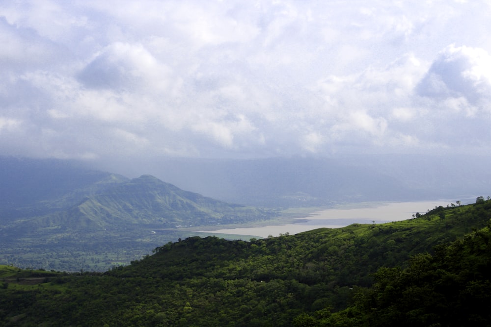 green mountains and gray clouds