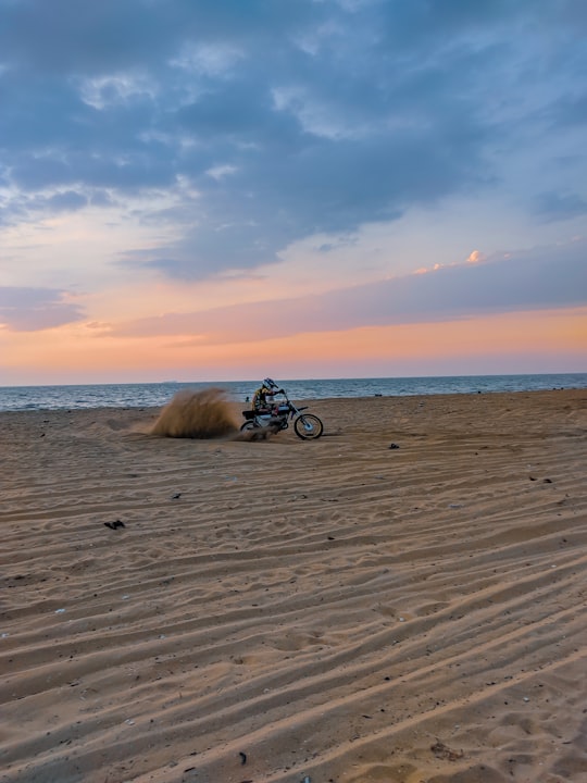 man riding on bicycle during daytime in Vypin India