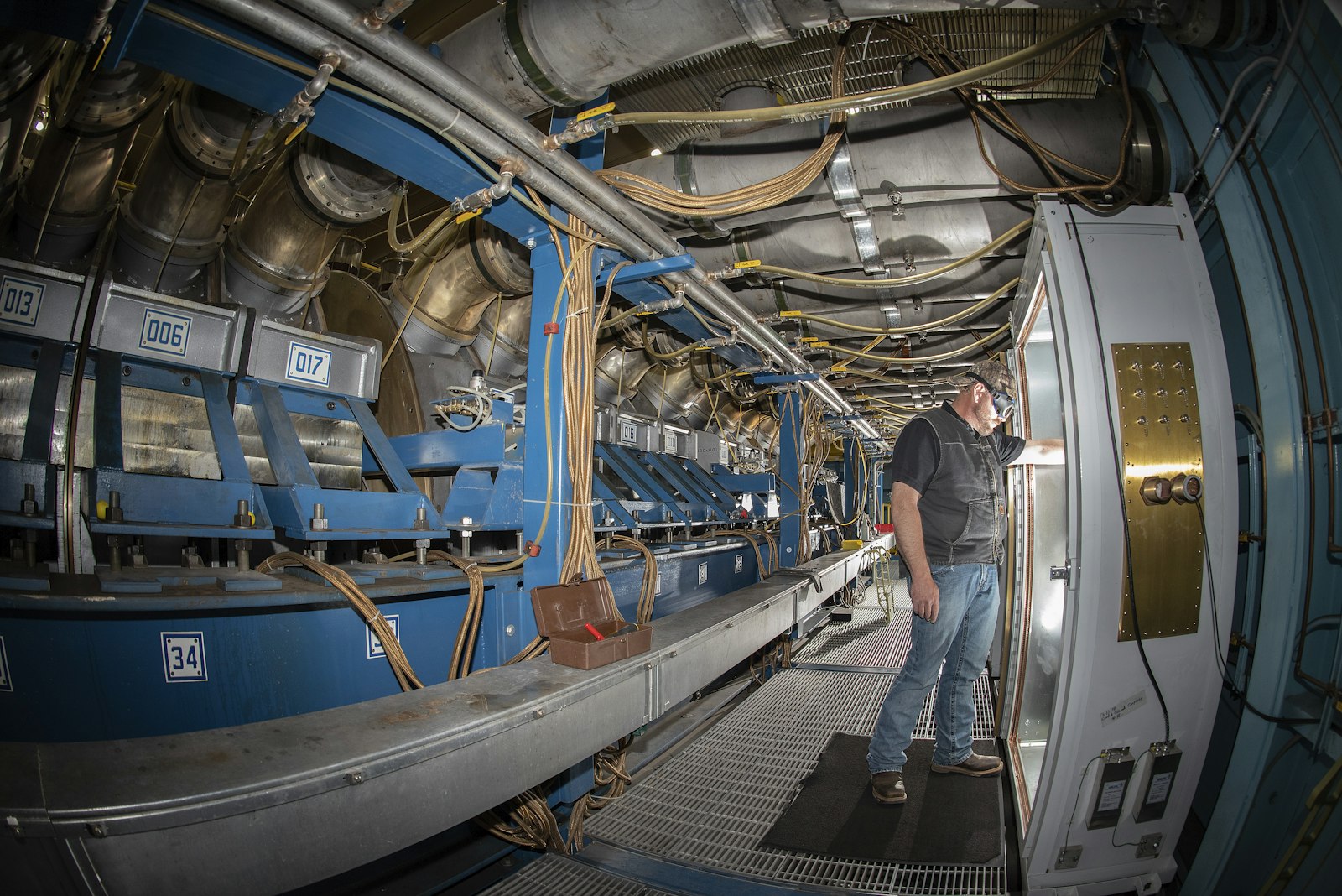 Nikon D750 + Nikon AF Fisheye-Nikkor 16mm F2.8D sample photo. Man inside blue and photography