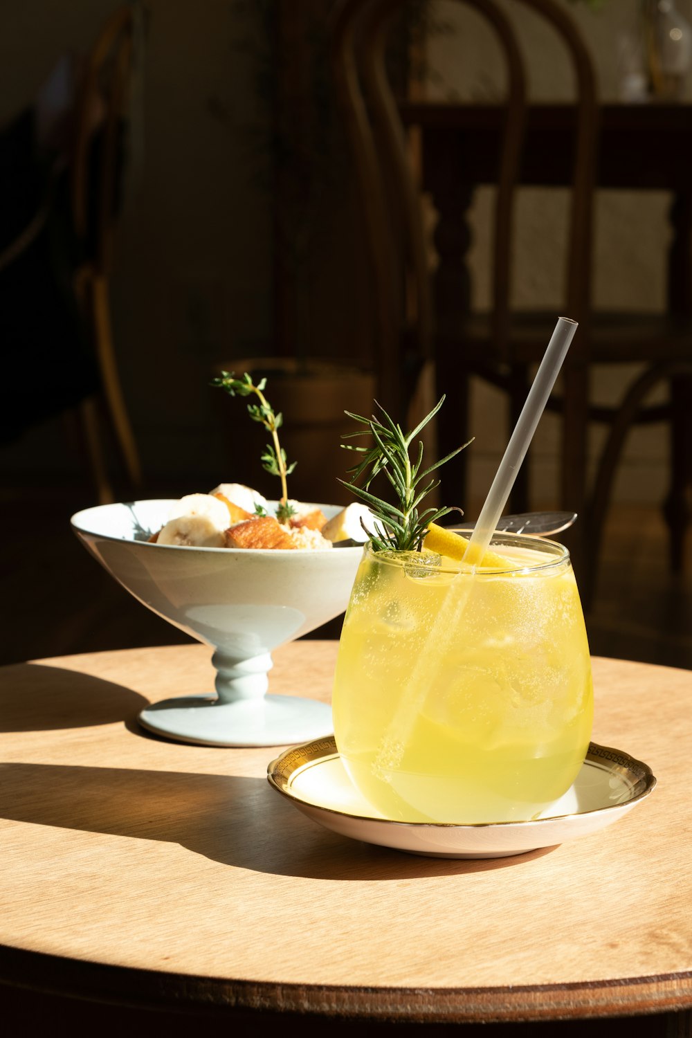 full-filled drinking glass on saucer