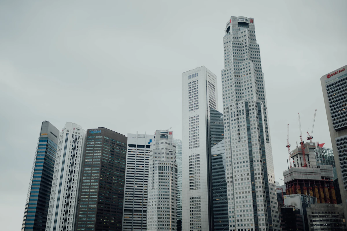 Singapore skyline representing REIT investments affected by Federal Reserve rate decisions