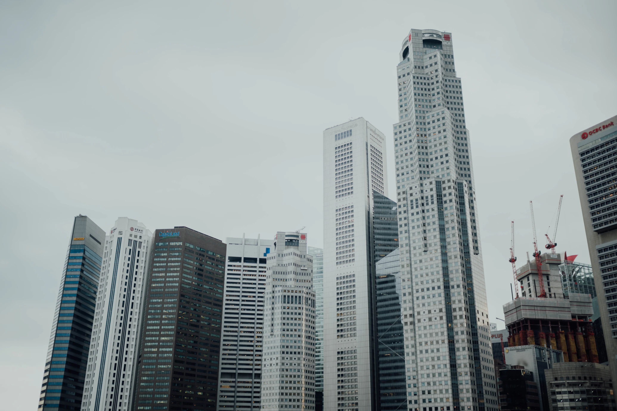 Singapore skyline representing REIT investments affected by Federal Reserve rate decisions