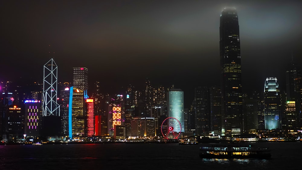 panoramic photography of high-rise building during nighttime