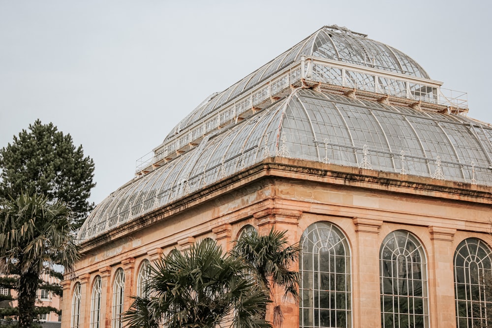 brown concrete glass ceiling dome building