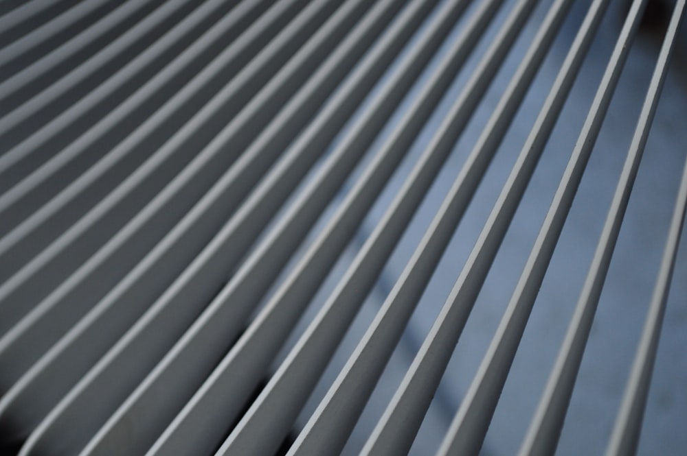 a close up of a metal slatted surface