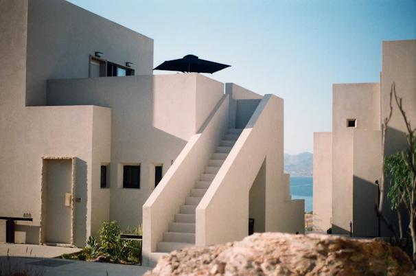 white concrete house under blue sky