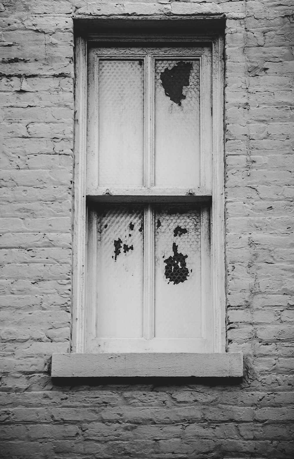 closed white wooden window