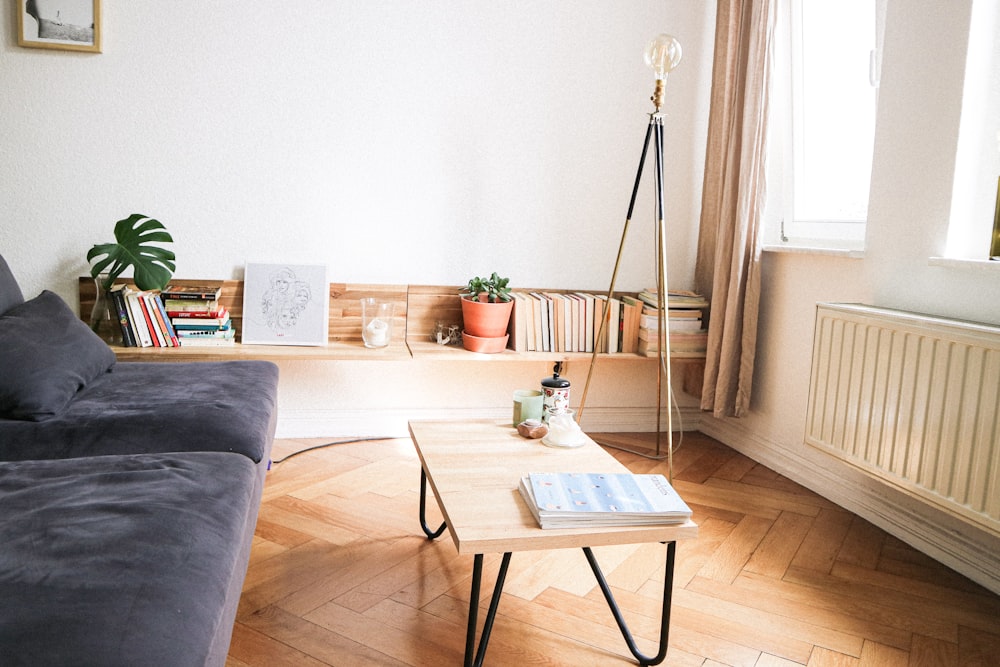 gray sofa chairs near wall