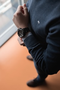 man in black sweater