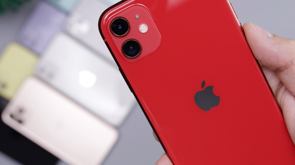 shallow focus photo of red iPhone 11