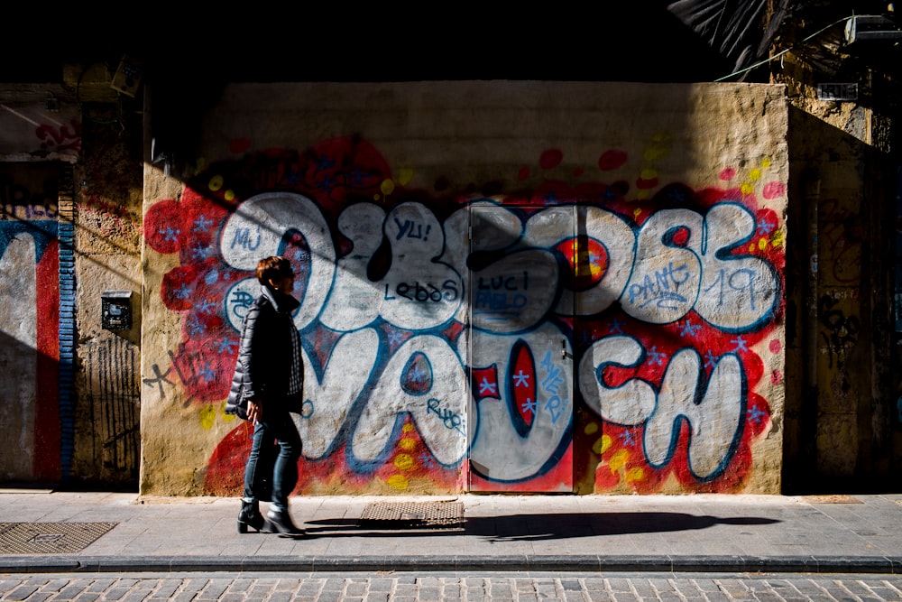 man near graffiti