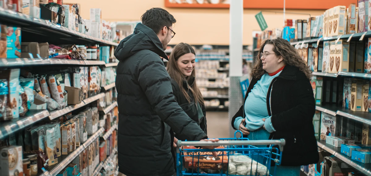 Family selecting groceries together in a store aisle