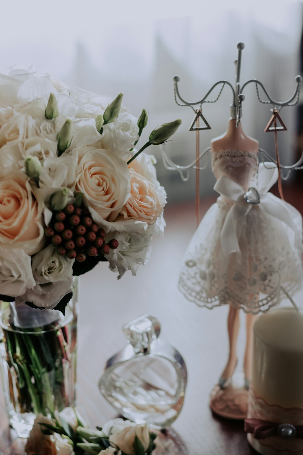 white rose bouquet in glass vase