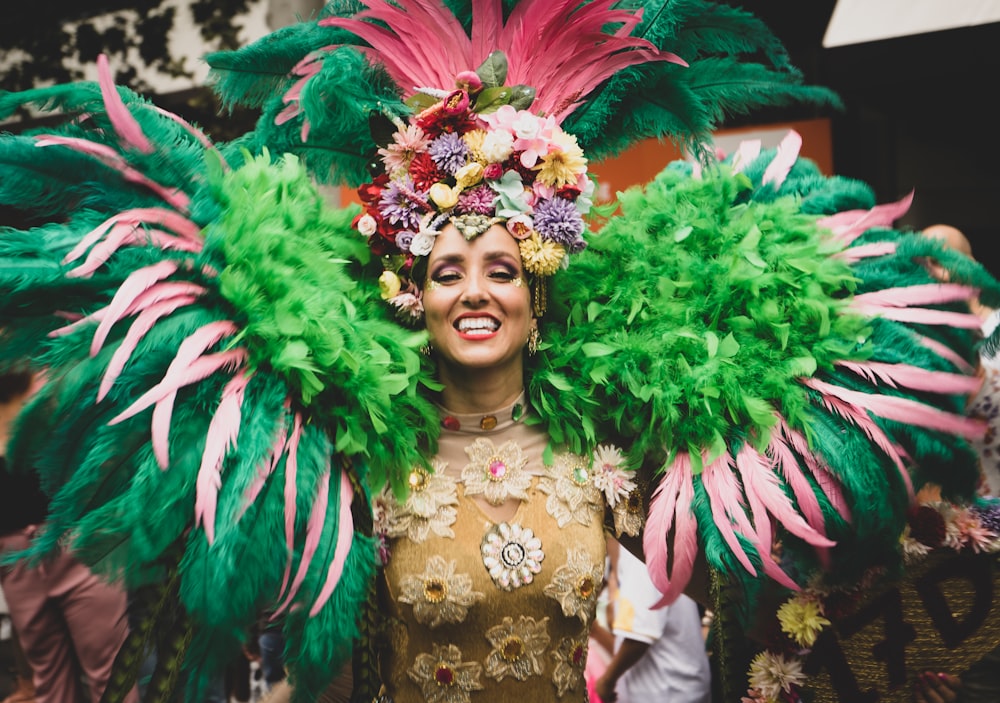 a woman in a green and pink costume