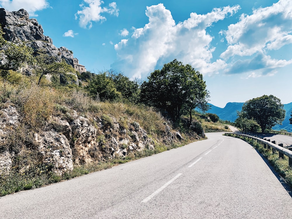 winding road on the side of a mountain slope