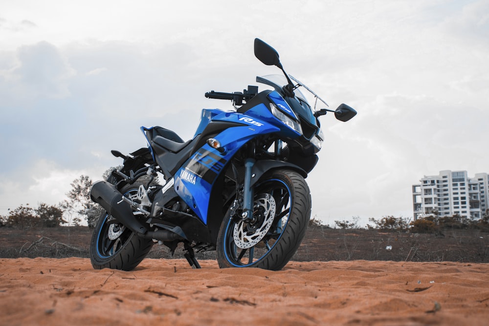 blue and black sports bike