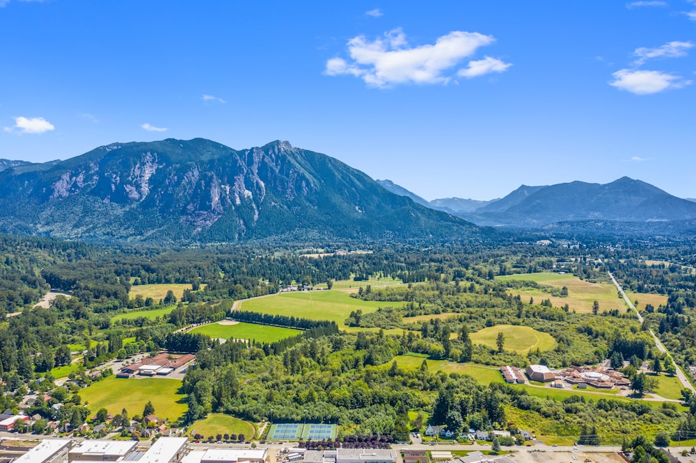 aerial photo of houses near mountain