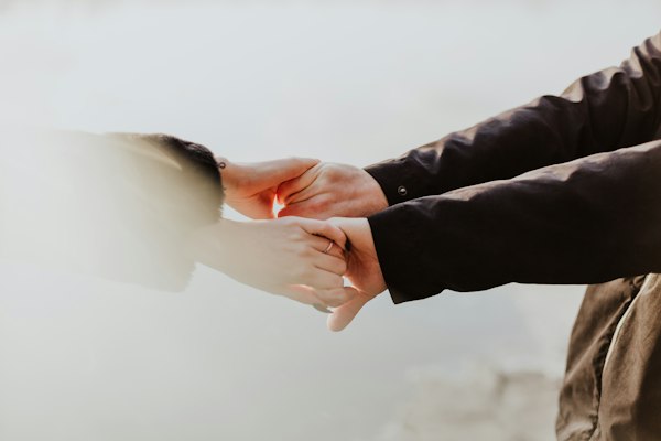 Couple holding hands