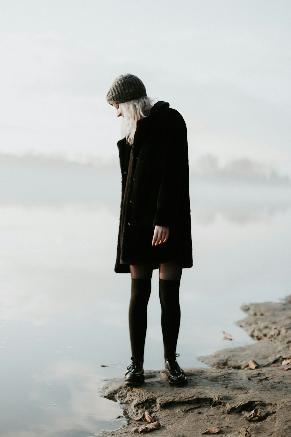 woman wearing black coat