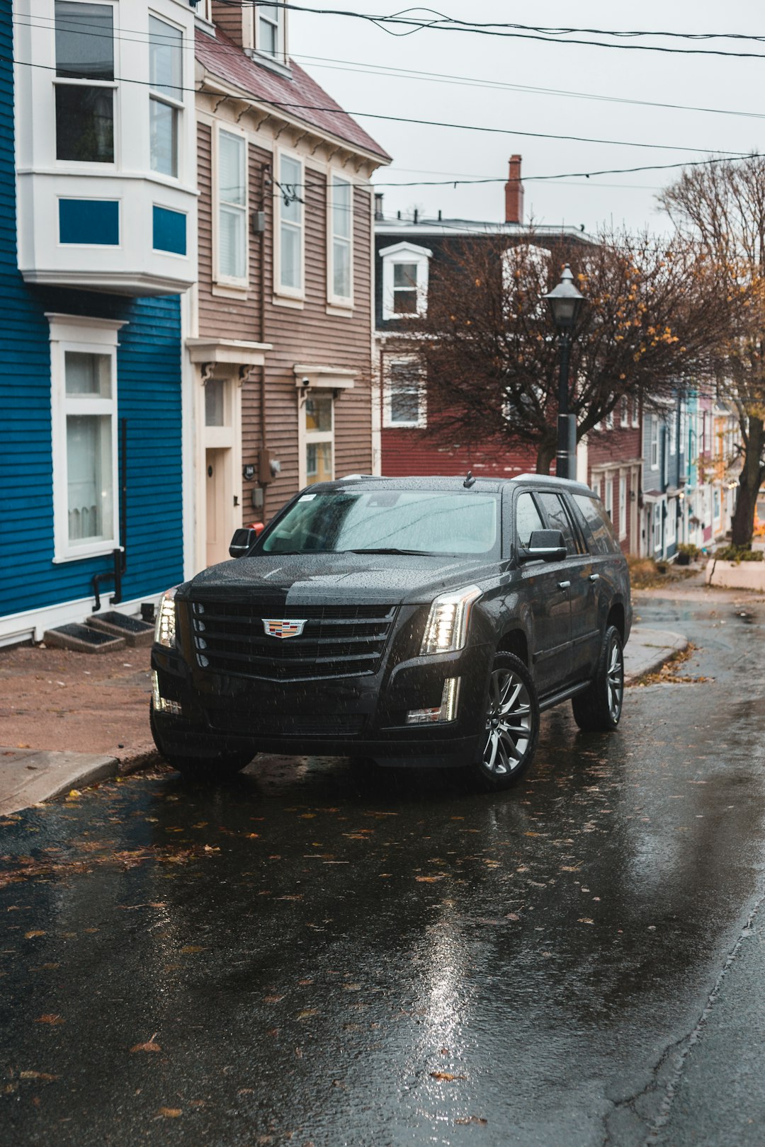 black Chevrolet SUV on road