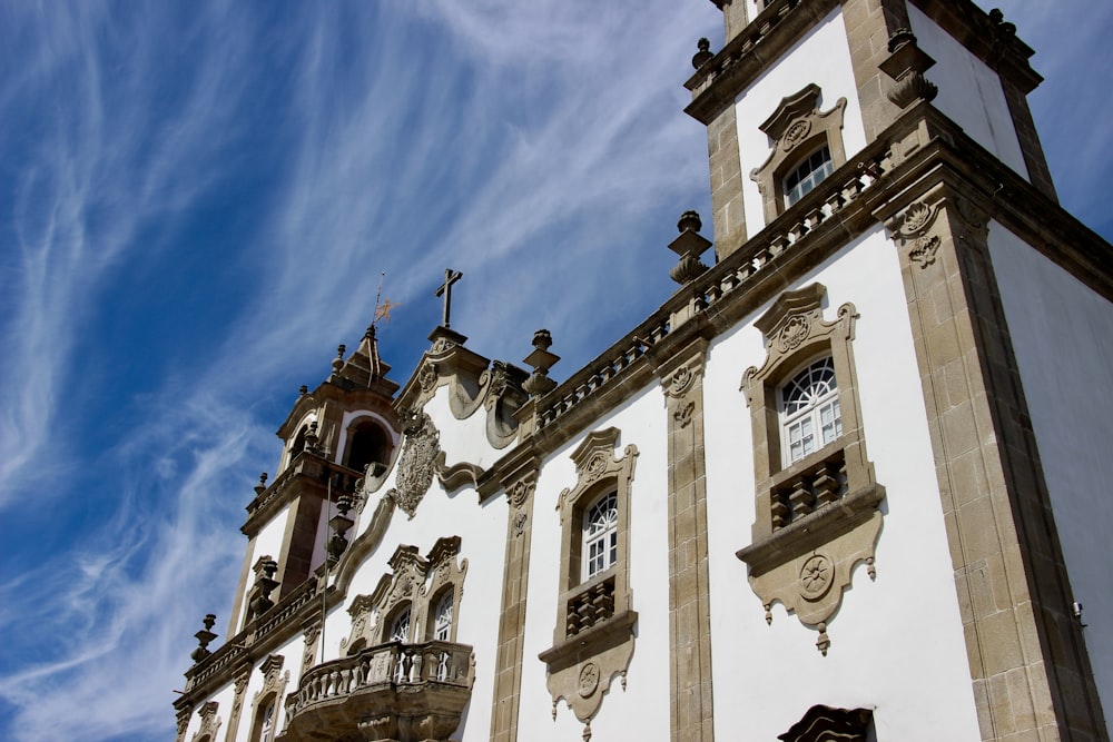 white and brown concrete church during daytime