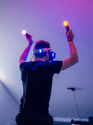 man playing using VR headset