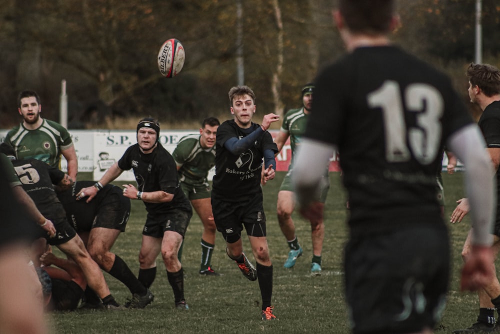 group of men playing football