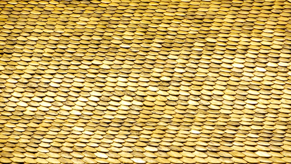 a close up view of a shiny gold surface
