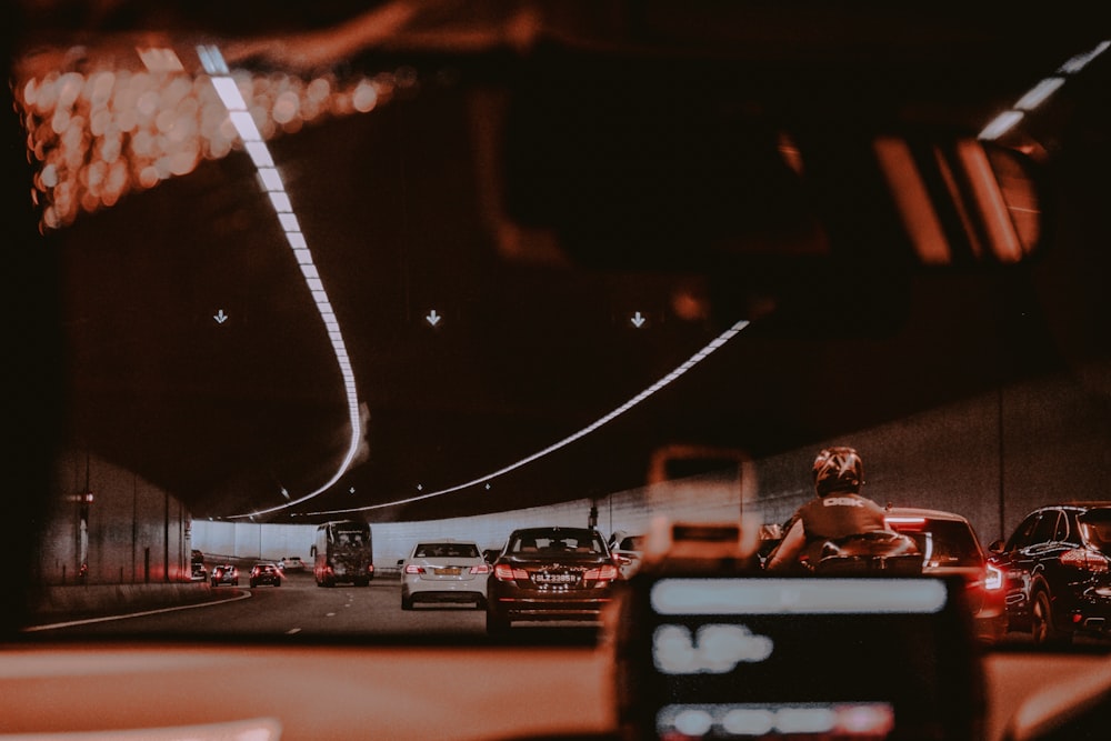 vehicles passing on tunnel