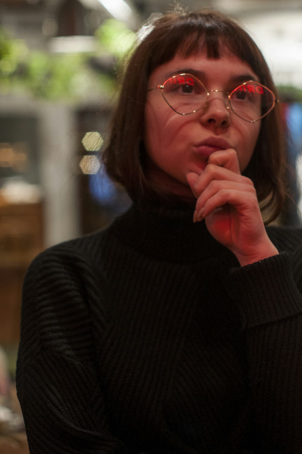 closeup photo of woman wearing eyeglasses