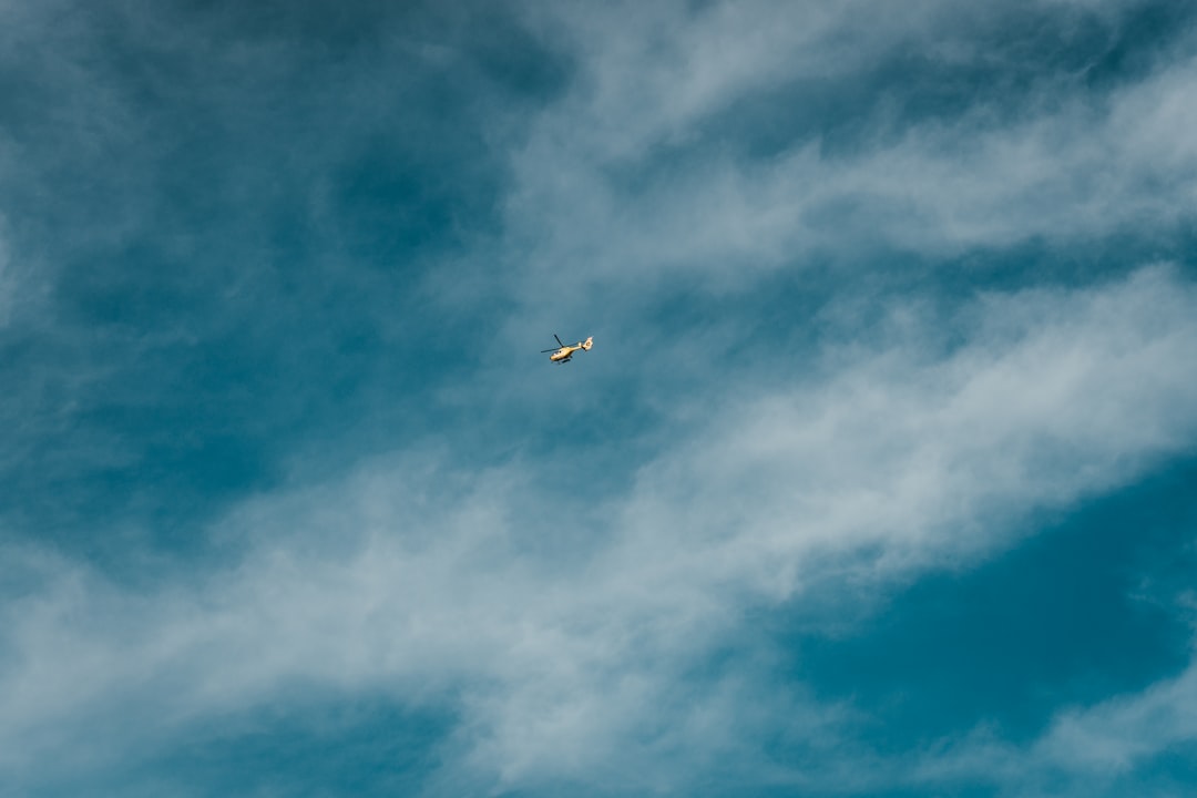 low-angle photography of an airplane in the sky