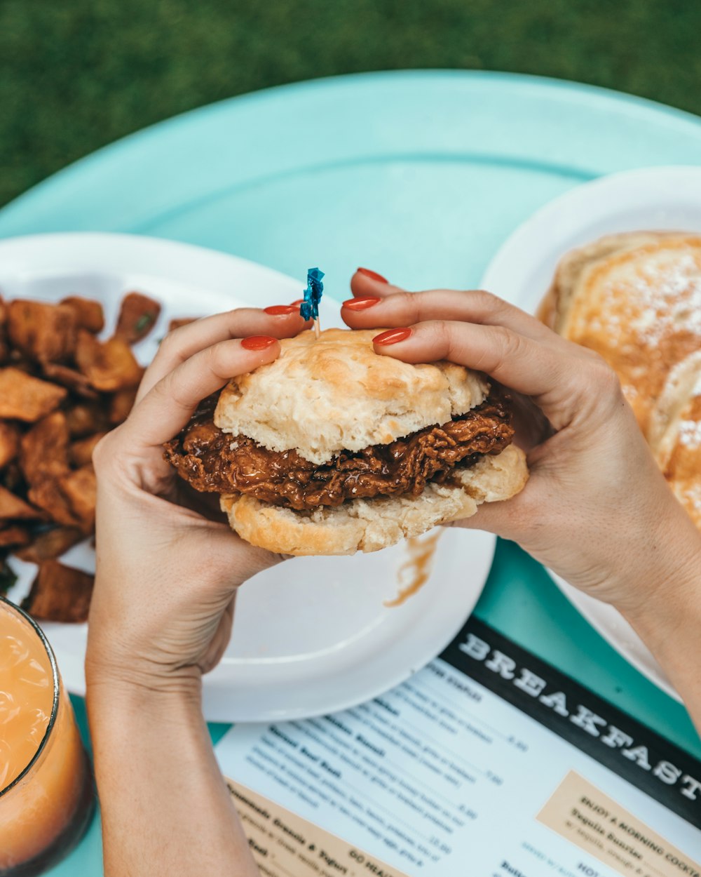 person holding burger