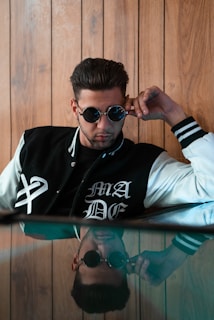 man wearing black and white jersey jacket