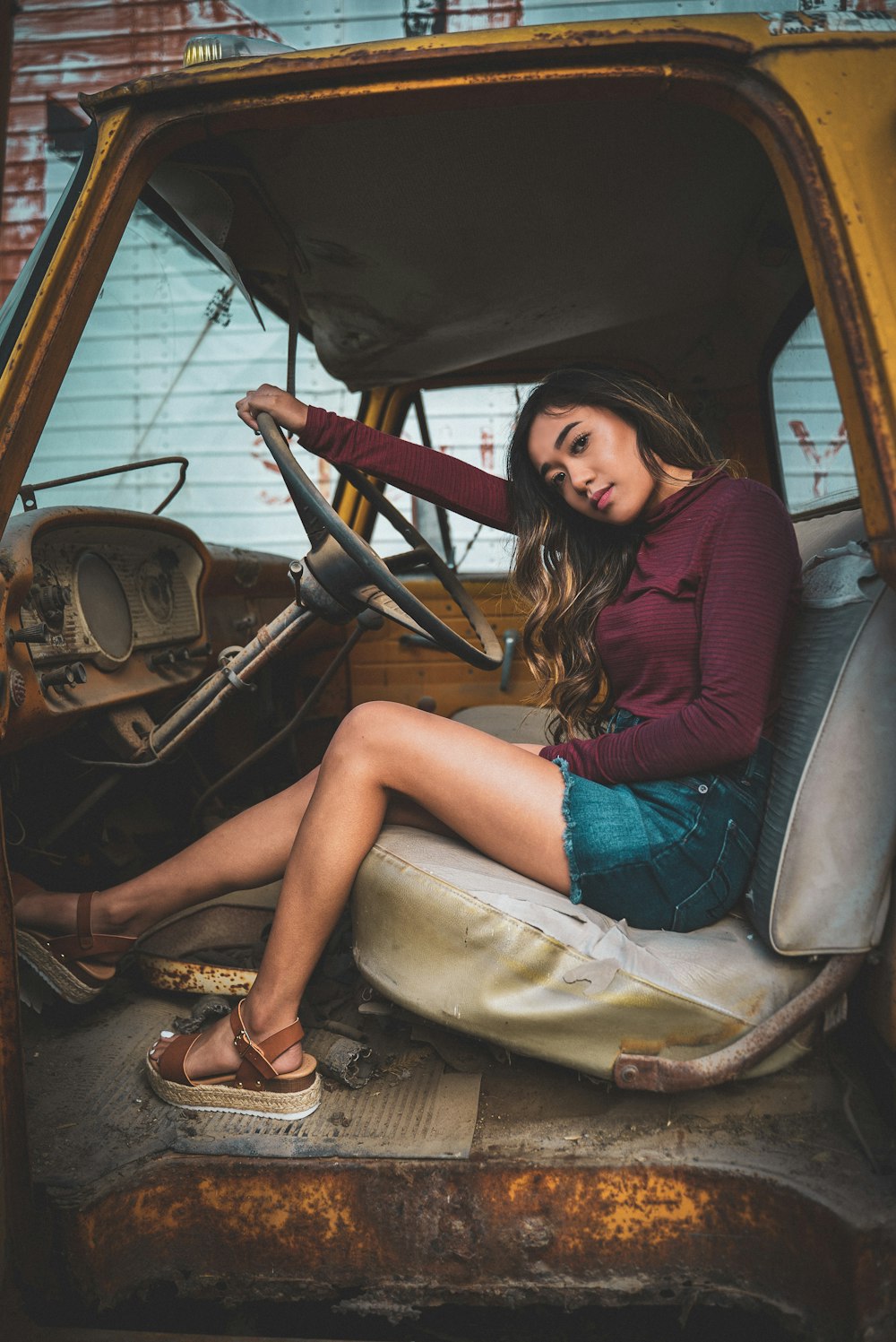 woman sitting inside a vehicle