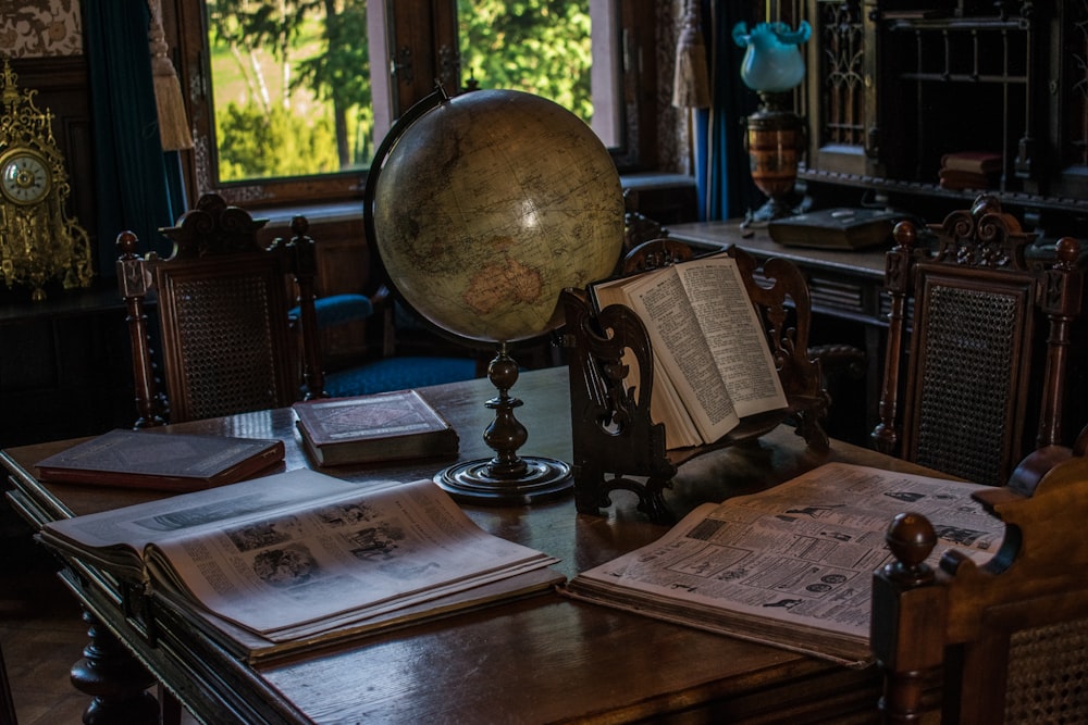 desk globe on wooden table