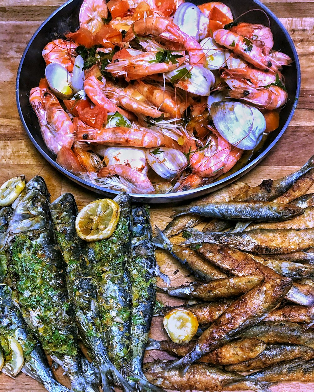 plate of shrimps on wooden surface