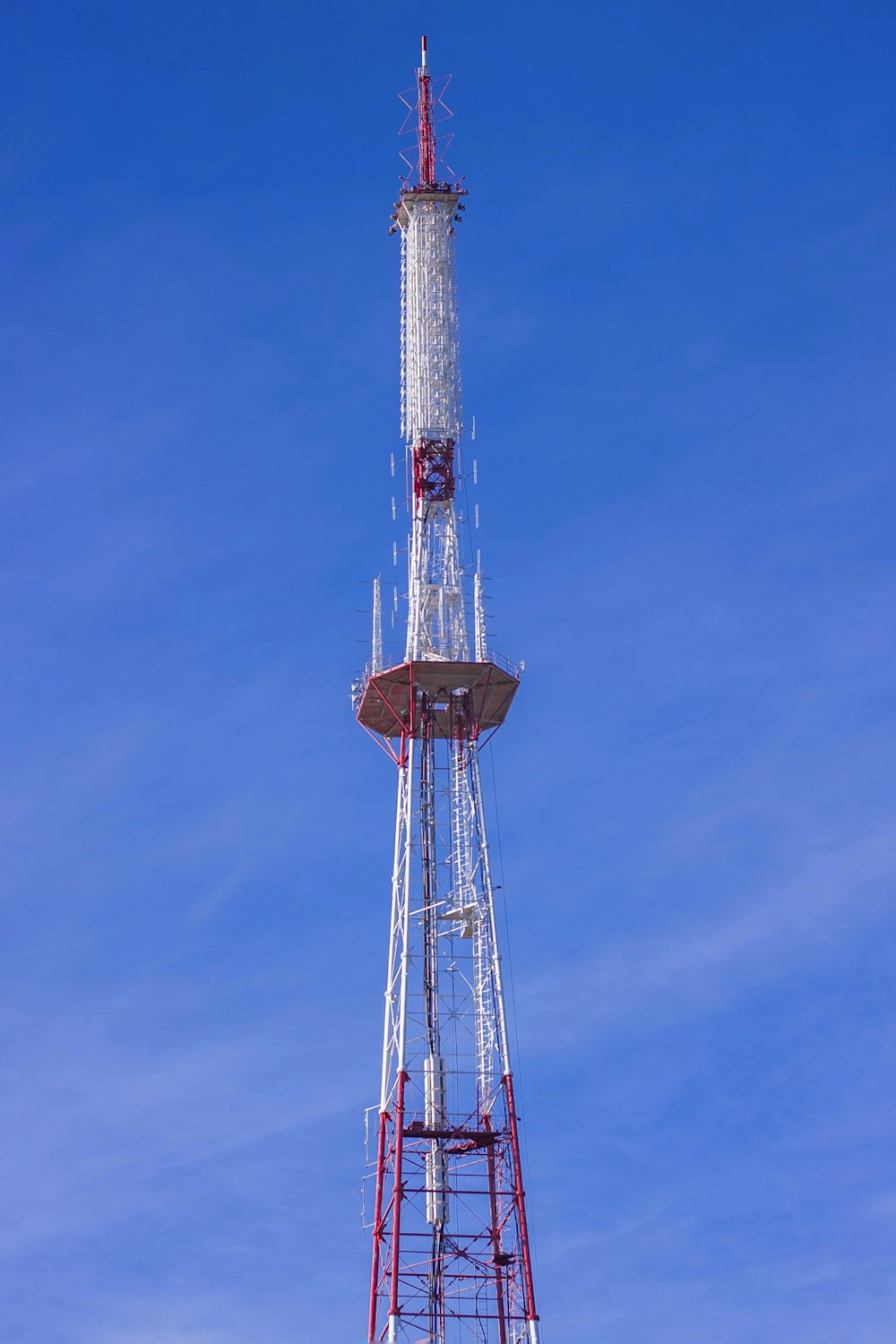 white and red metal tower