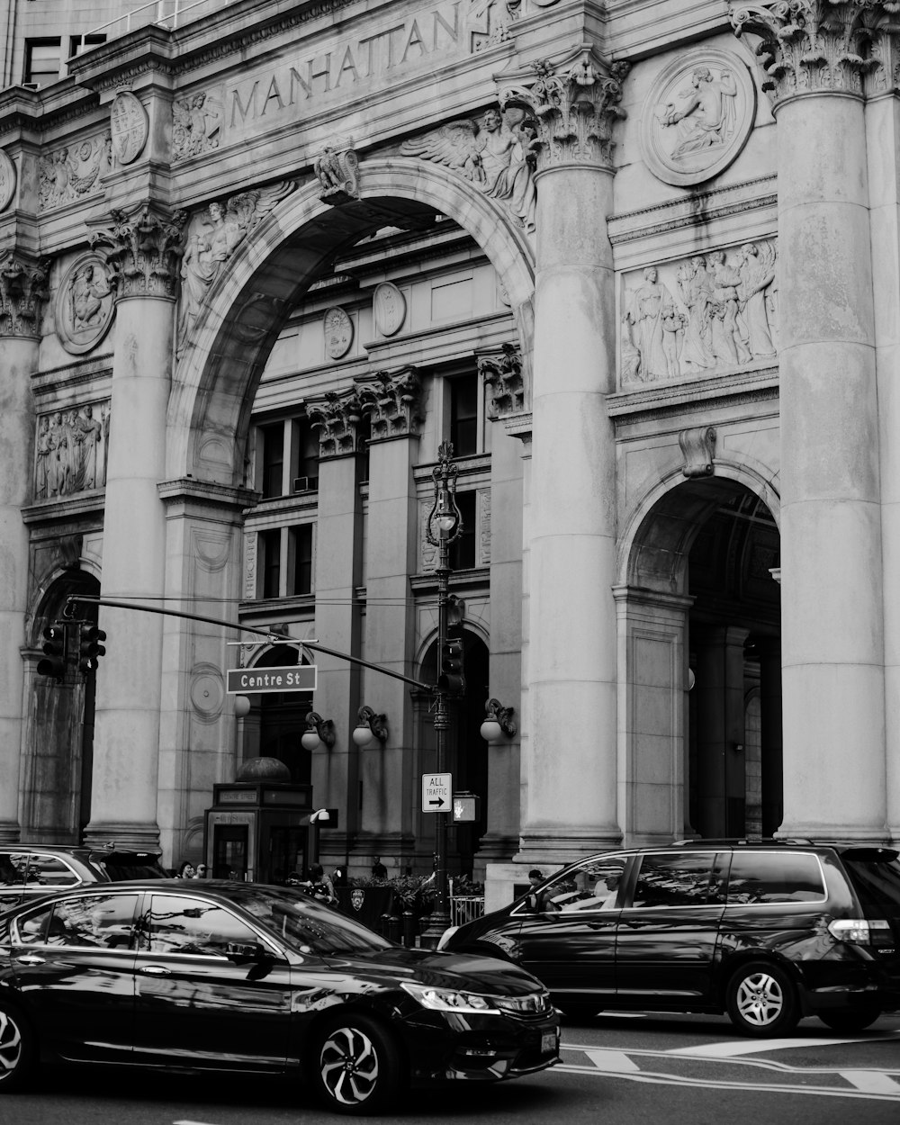 grayscale photo of concrete arch