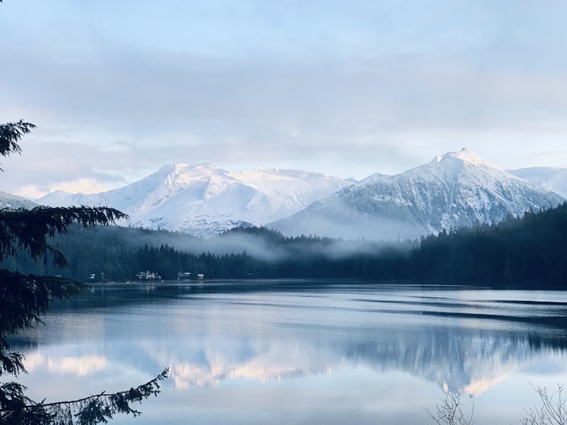How can mileage and status partnerships lower the cost of Alaska business class tickets