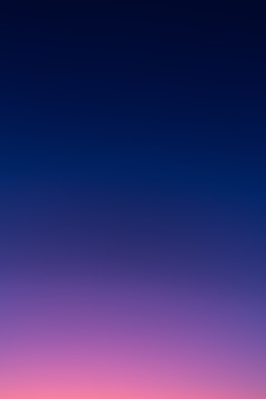 a group of people standing on top of a beach