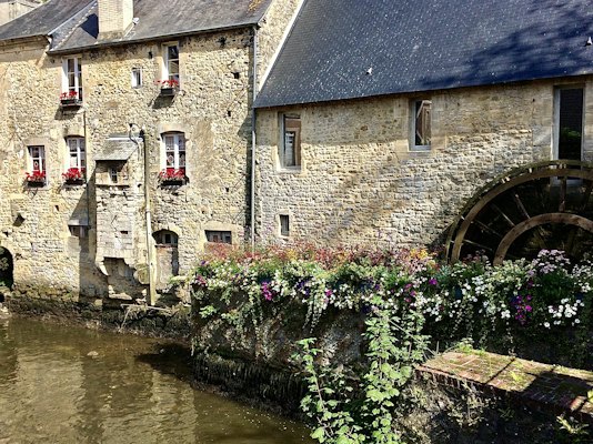An old water mill on the Aure — Bayeux, France